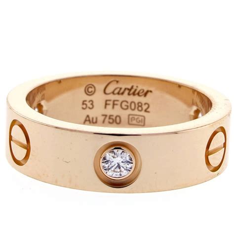 Cartier three diamond love ring